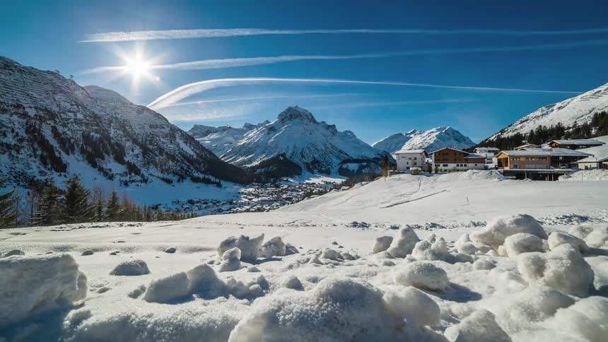 Houses at the base of a mountain