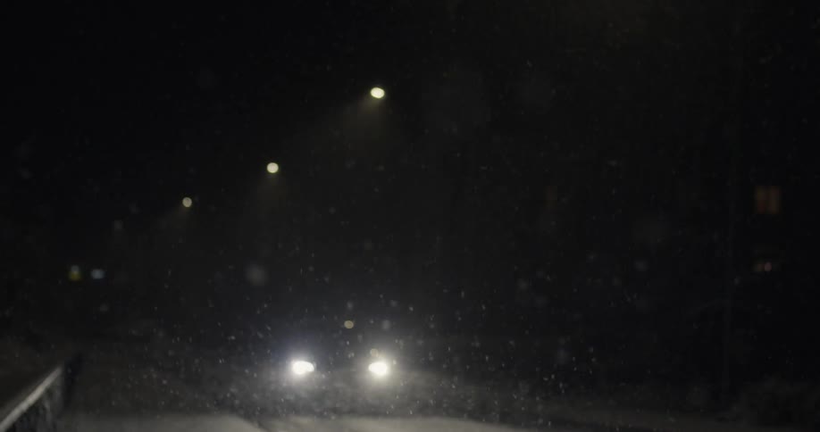 A car drives in the snow