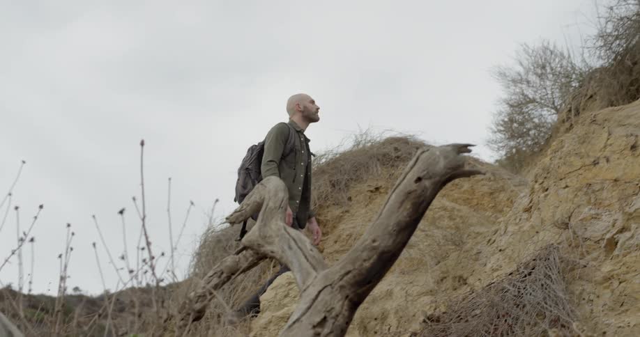 A man climbs the hill