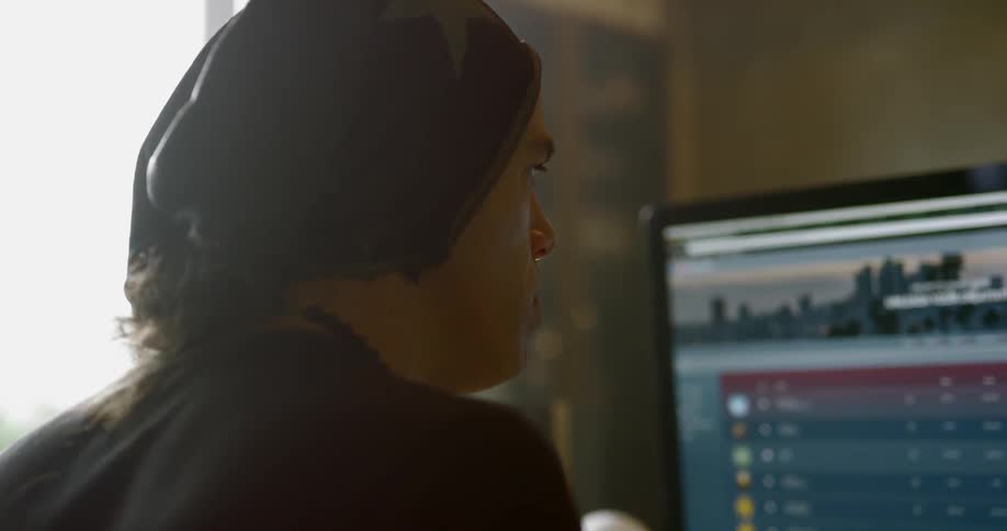 A man works on a computer