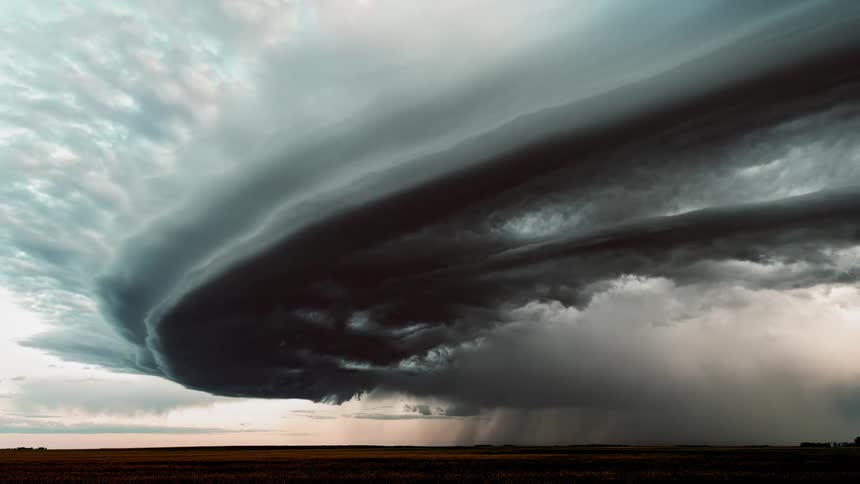 Dark storm front moves across prairie