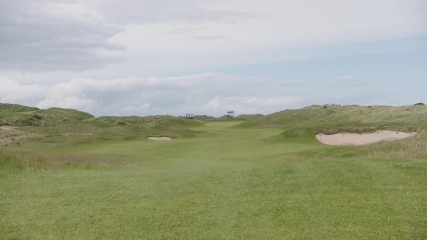 A golf course with sand dunes