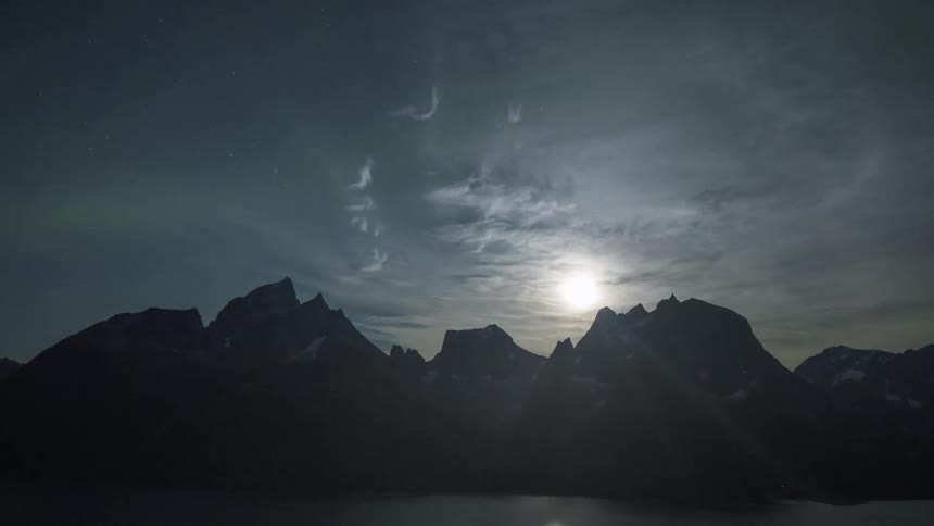 Clouds move over a mountain range