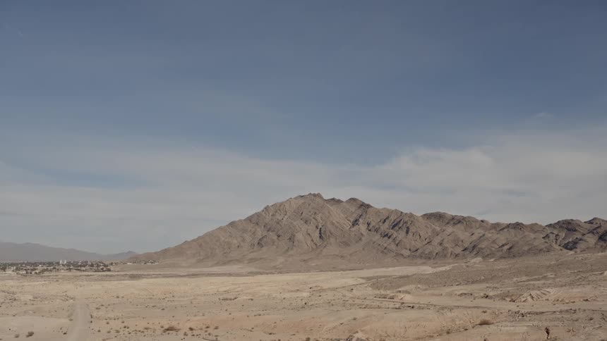 Town in desert bordered by mountains
