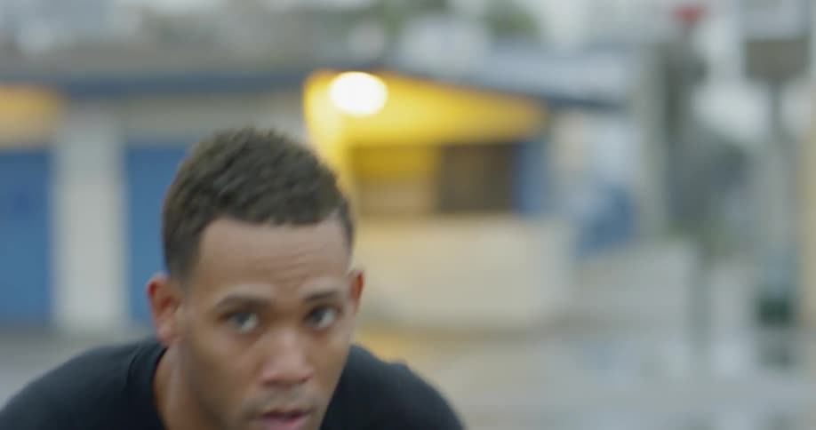 A man bouncing a basketball