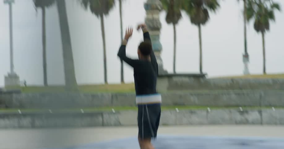 A man bouncing a basketball