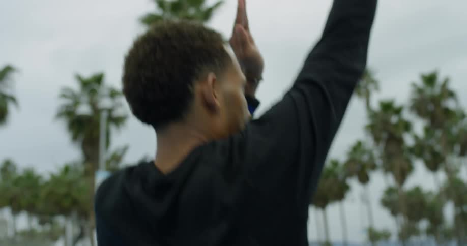 A man shoots a basketball