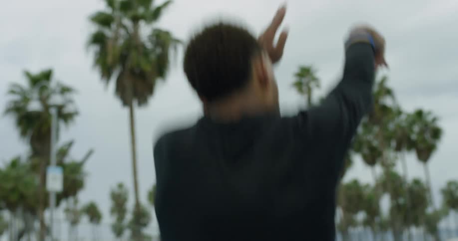 A man shooting a basketball