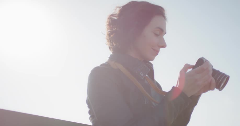 A woman looking at a camera