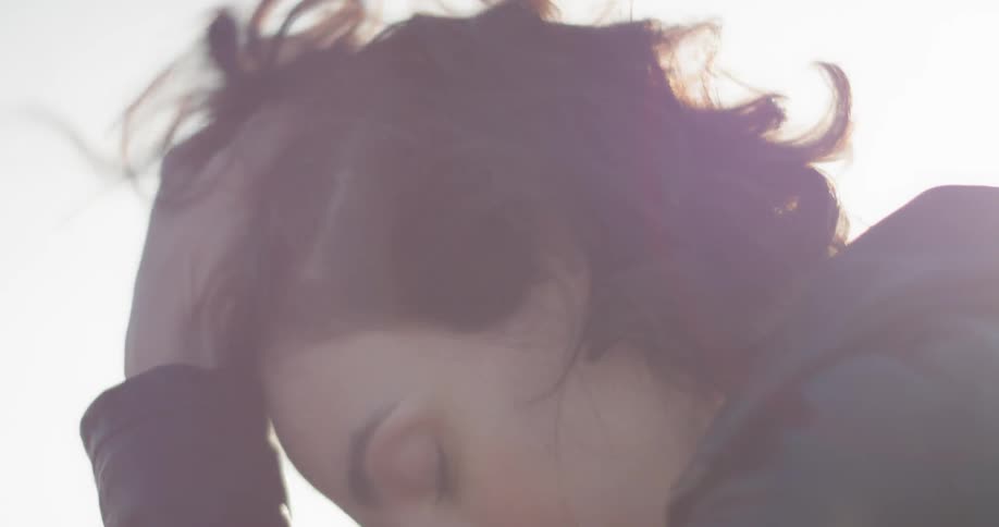 A woman looking into the sky