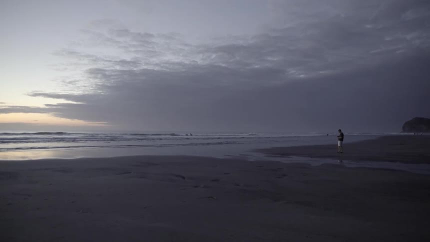 Ocean Waves Crashing On Sandy Beach With Powerful Coastal Motion