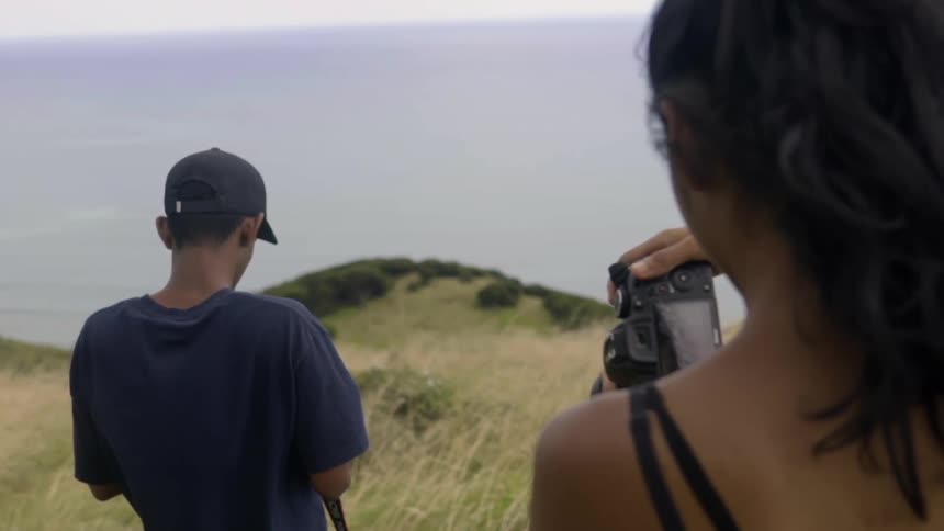 Friends Taking Pictures of Nature in a Lush Forest, Experiencing Peace and Wonder.