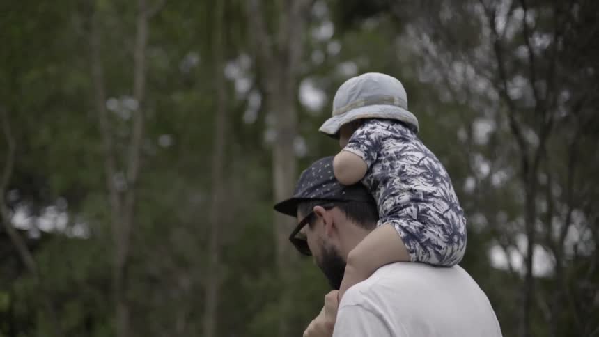 Father  Giving a Sweet Piggyback Ride to a Baby, Sharing Laughter and Joy.