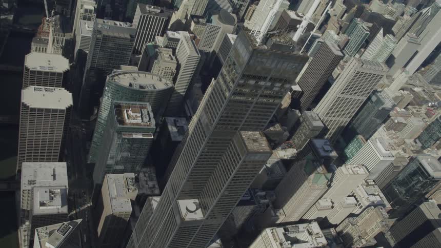 A skyscraper surrounded by buildings and roads