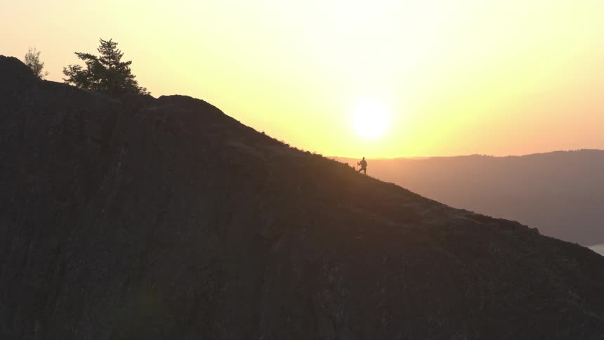 Person climbing on a mountain