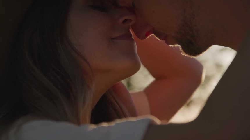 Two people caressing each other