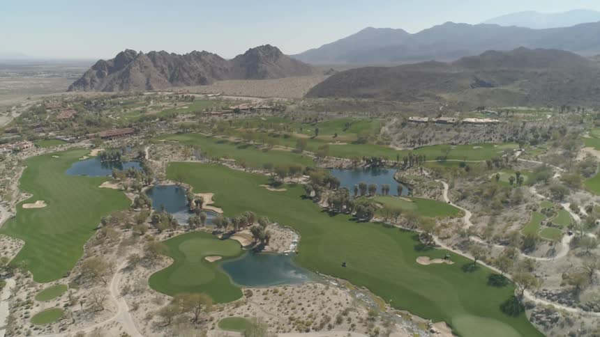 Golf course sits near the mountains