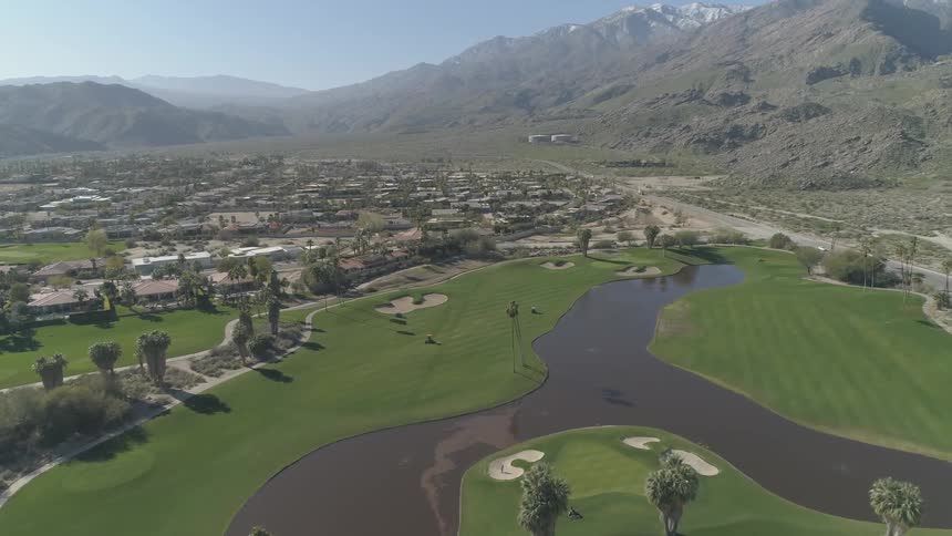 Aerial view of a neighborhood and golf course