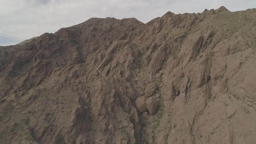 The mountain is tall and full of sharp edges