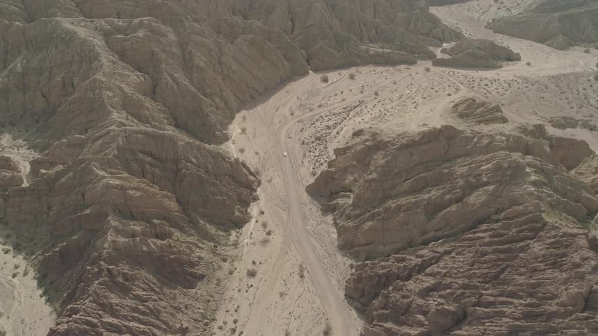 Driving through a desert road