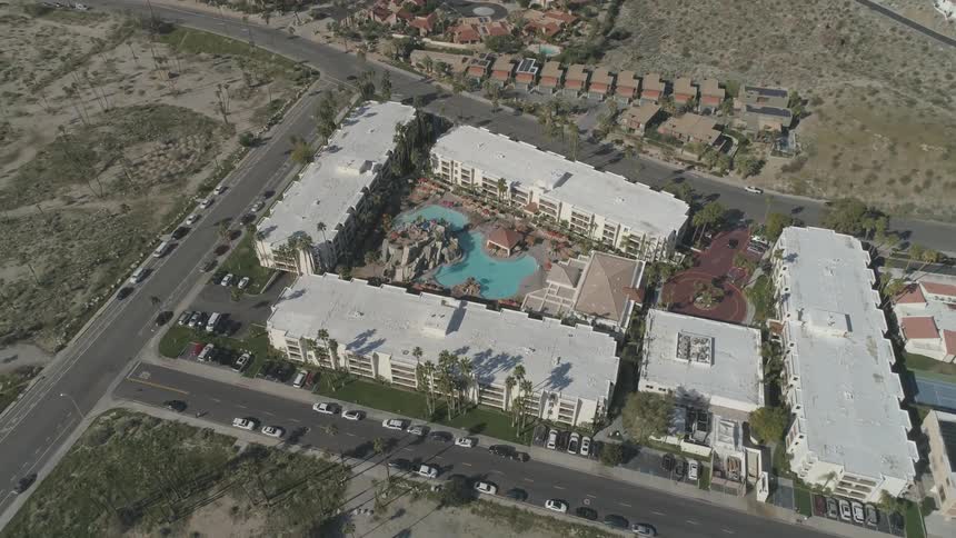 Buildings with a pool in between them