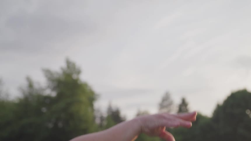 A person throws a ball