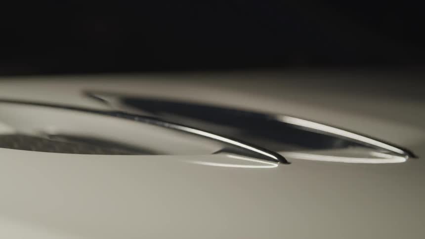 The light shines briefly on the vehicle
