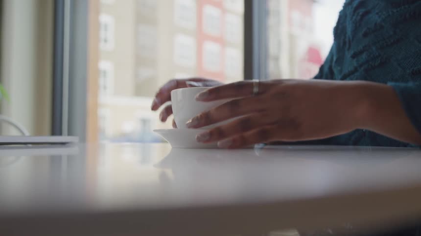 Woman drink from a cup