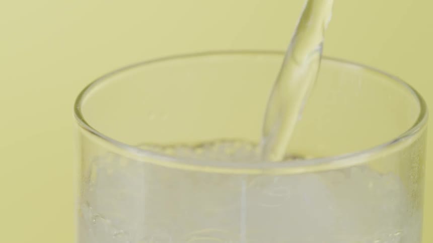 Water is poured into a glass