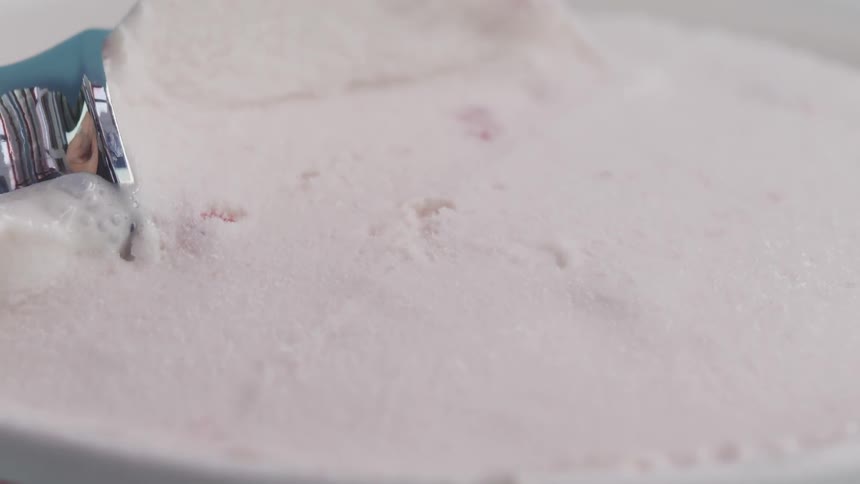 Scooping out of ice cream