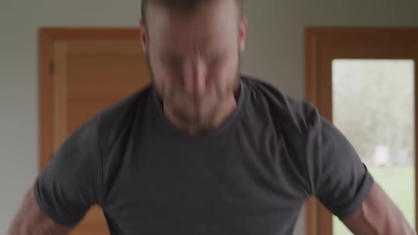 A man lifts weights