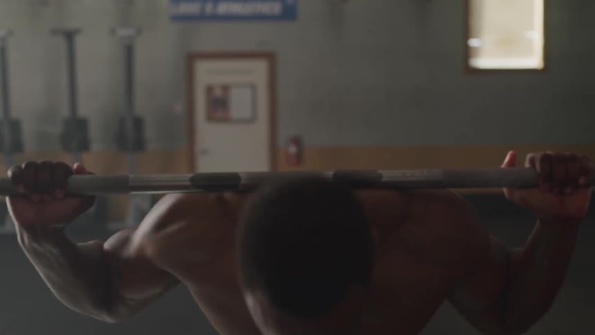 Man motivating himself to lift heavy weights