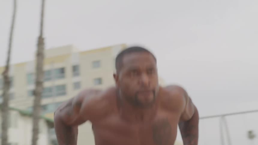 A man is exercising outdoors