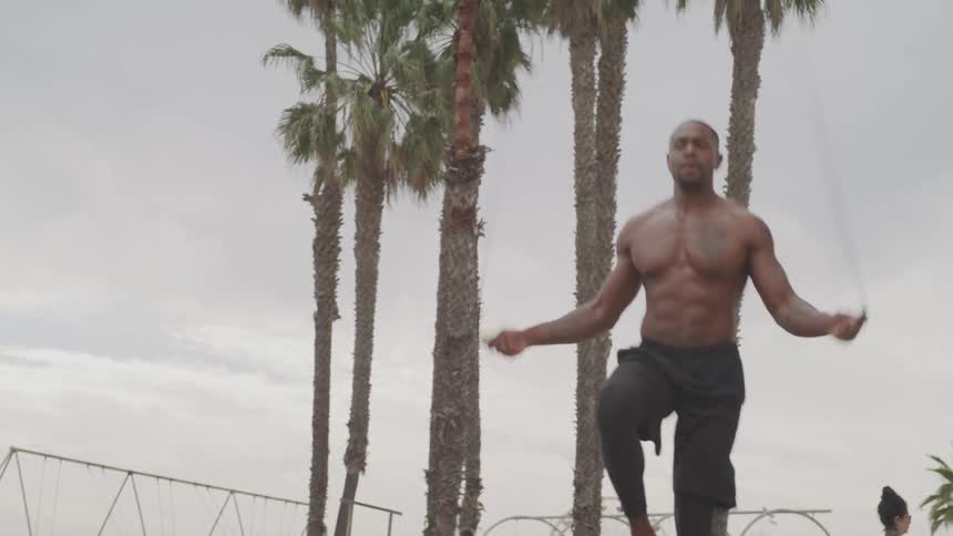 A man is jumping rope