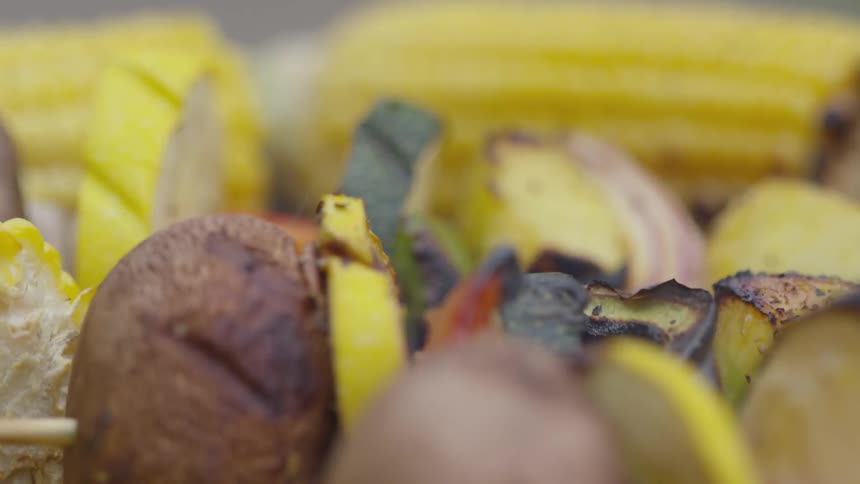 Grilled vegetable kebabs with corn on the cob