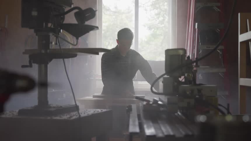 A person works in a workshop
