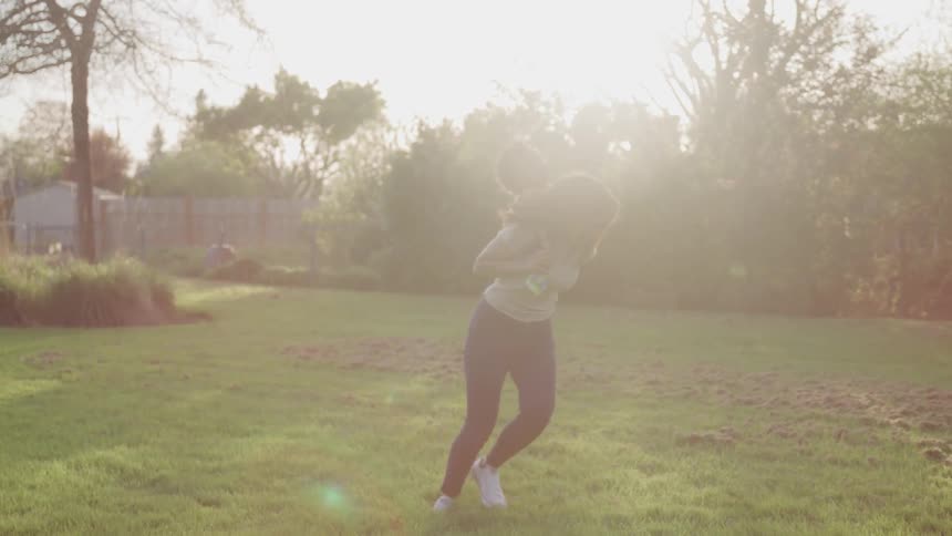 Two kids are playing outdoors