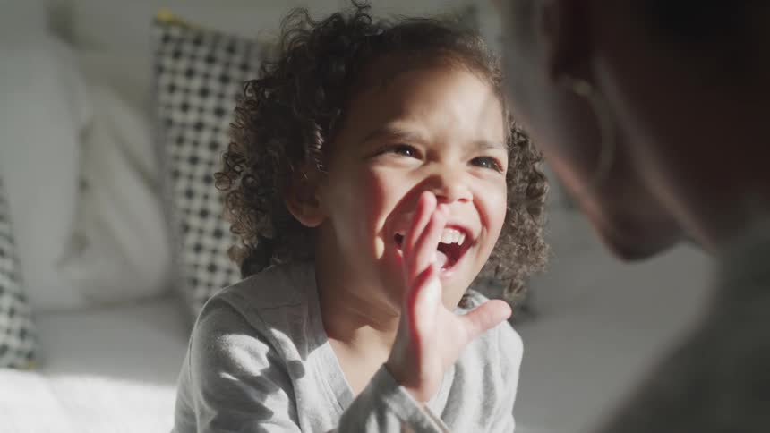 A parent is talking with a child