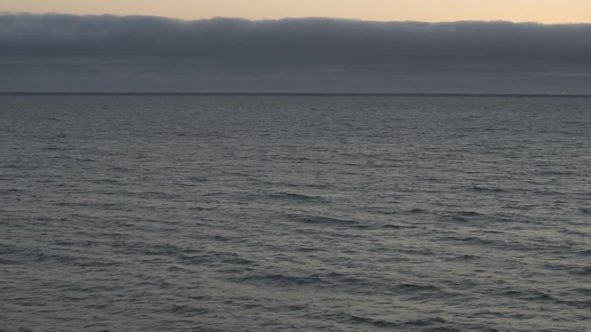 Waves roll across the ocean