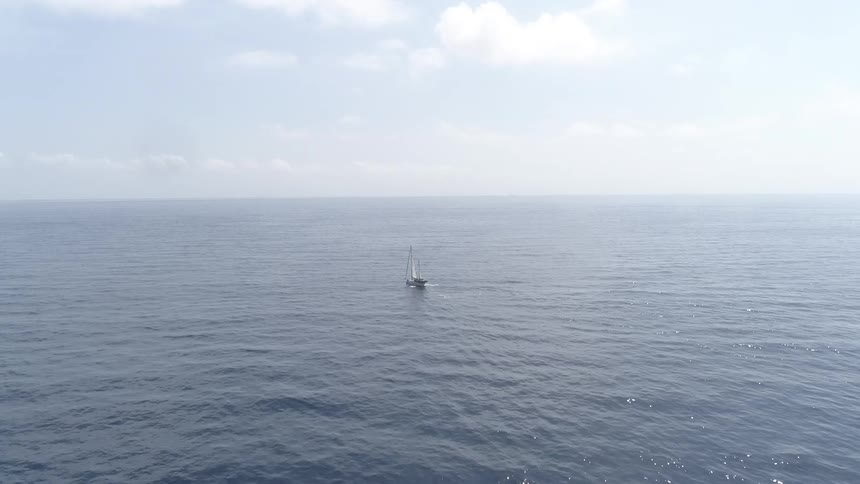 A boat is going forward in motion through the waves