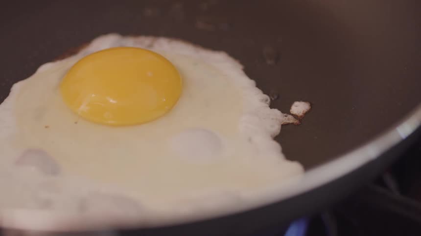 A egg frying in a pan