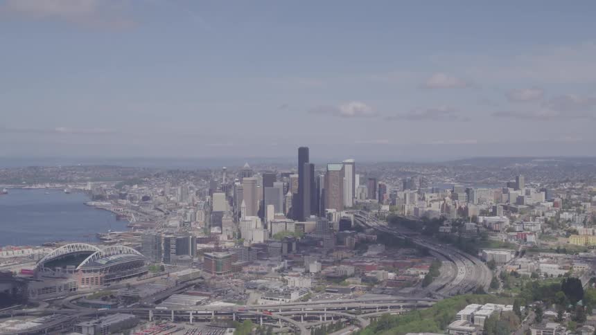 A city sits next to a body of water