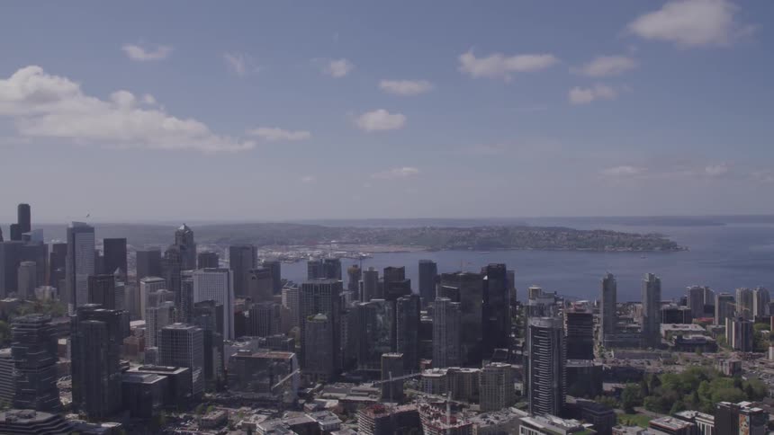 An aerial view of skyscrapers in a downtown area