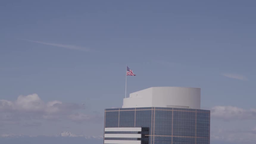 An american flag on top of a building