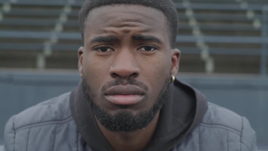Black male in a stadium