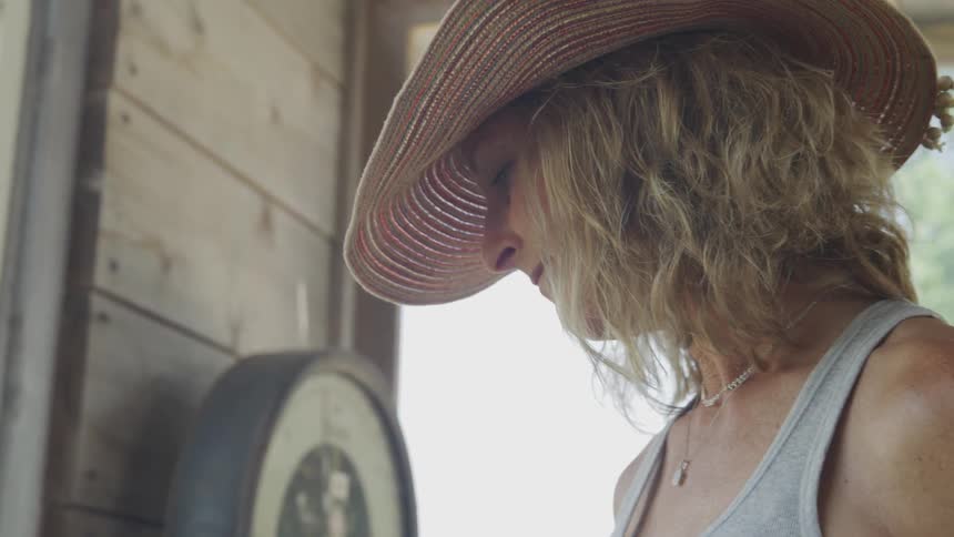 Girl wearing a hat smiling