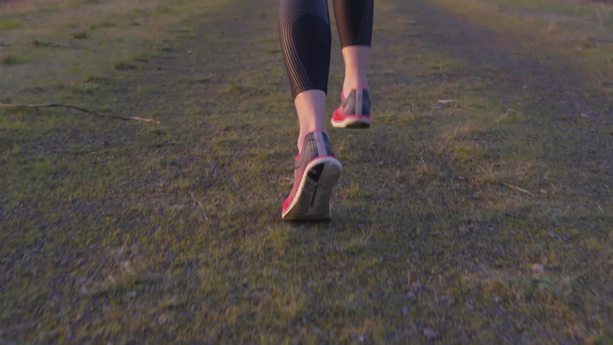 Girl running in a field