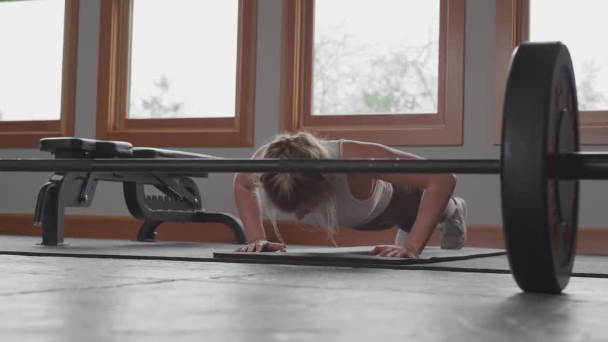 A woman is working out indoors