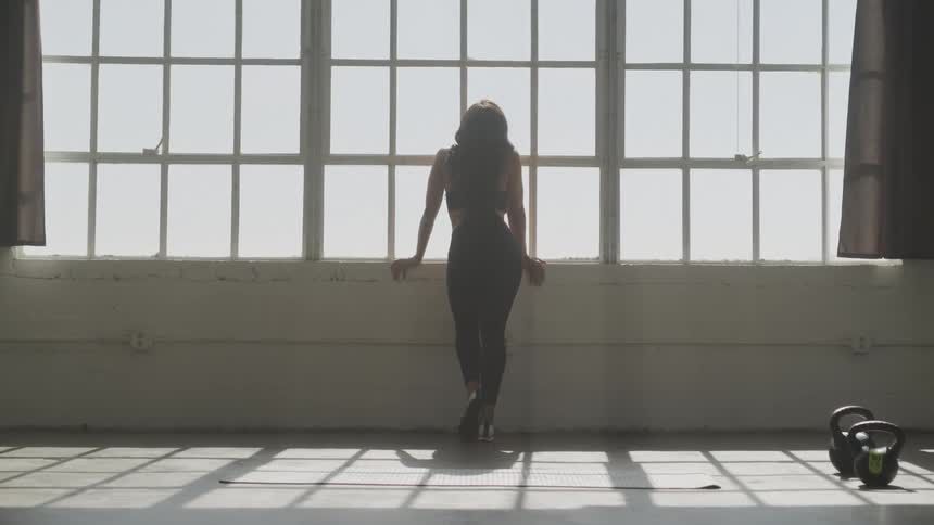 Girl standing in the window