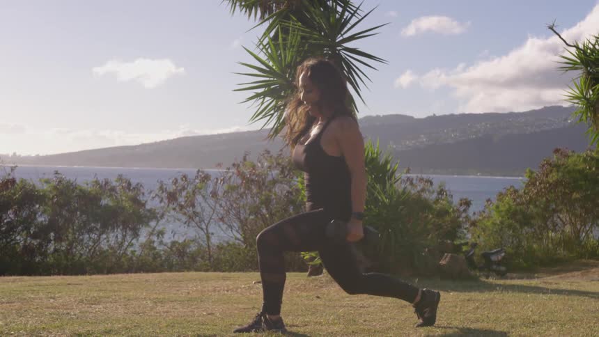 Girl lunging with weights